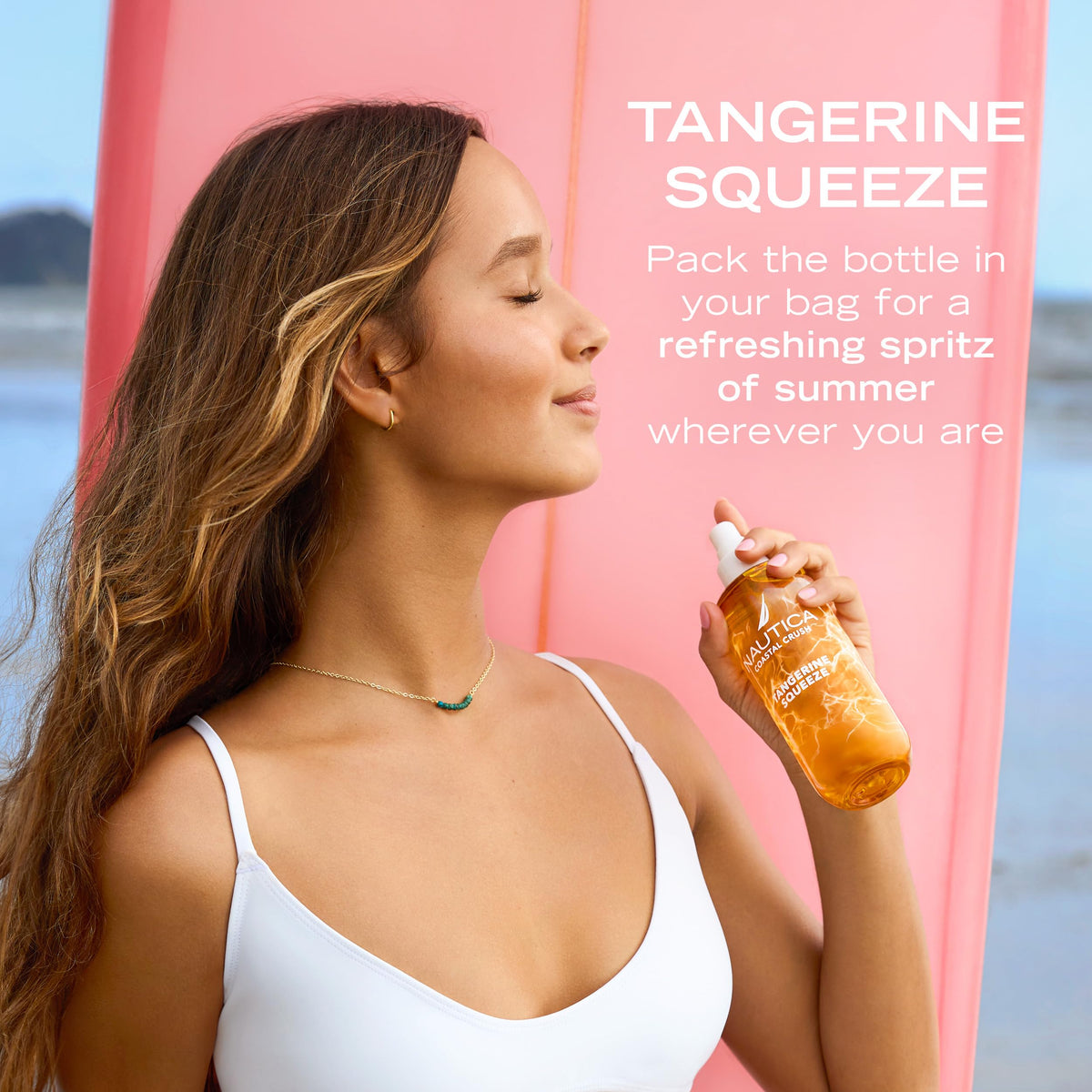 Nautica Tangerine Squeeze Body Mist in a beach setting