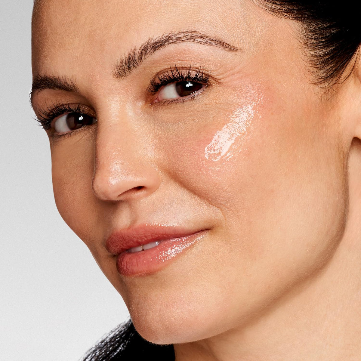 NEOSTRATA Tri-Therapy Lifting Serum with other skincare products.