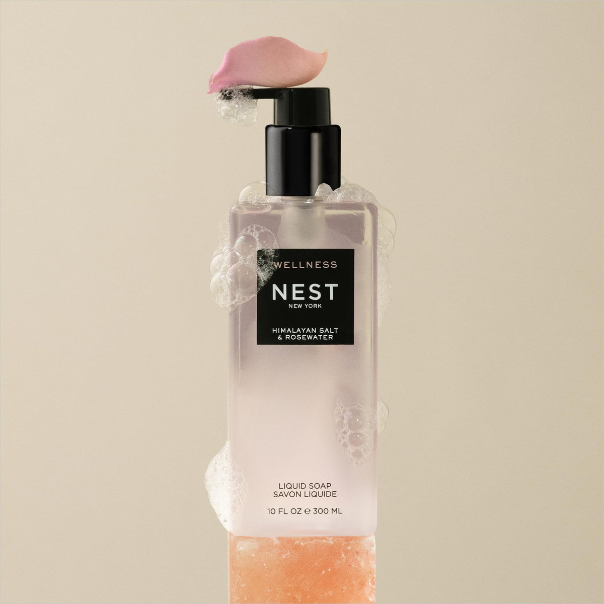 NEST New York Himalayan Salt & Rosewater Hand Soap with floral background