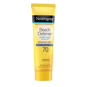Neutrogena Beach Defense Sunscreen Lotion SPF 70 on beach towel