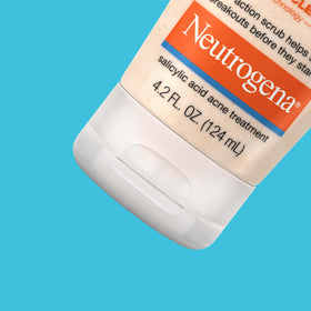 Neutrogena Oil-Free Acne Face Scrub 4.2 oz in bathroom setting
