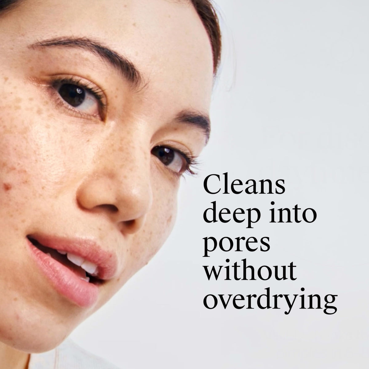 Neutrogena Rapid Clear Acne Pads with a hand holding one pad