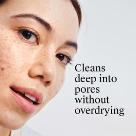 Neutrogena Rapid Clear Acne Pads with a hand holding one pad