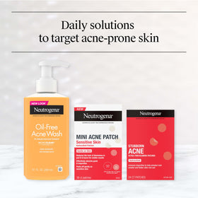 Neutrogena Stubborn Acne Patches with a hand applying a patch