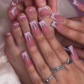 NHIXK press on toenails displayed with nail art accessories