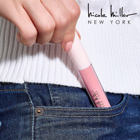 Nicole Miller lip glosses arranged by colour