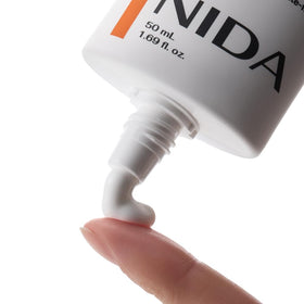 NIDA Invisible Fit Sunscreen SPF 50 close-up of the pump