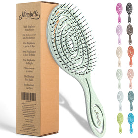 Ninabella Detangler Brush front view in natural green