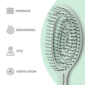 Ninabella Detangler Brush in use on wet hair