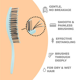 Ninabella Mini Detangler Brush in a purse for travel