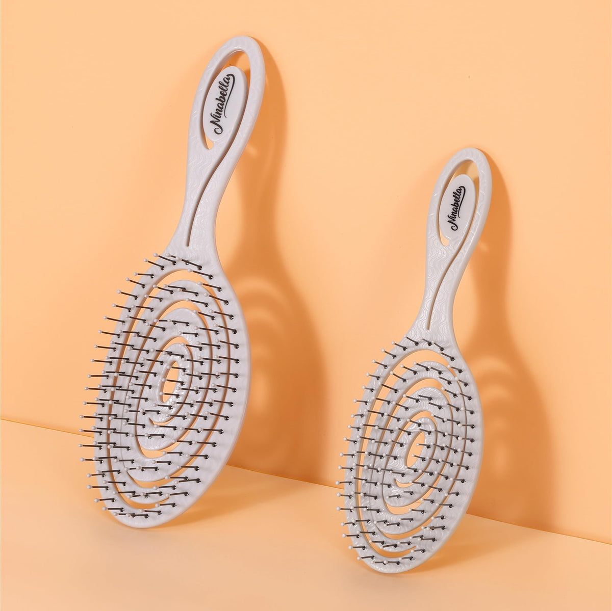 Ninabella Mini Detangler Brush with rounded bristle tips