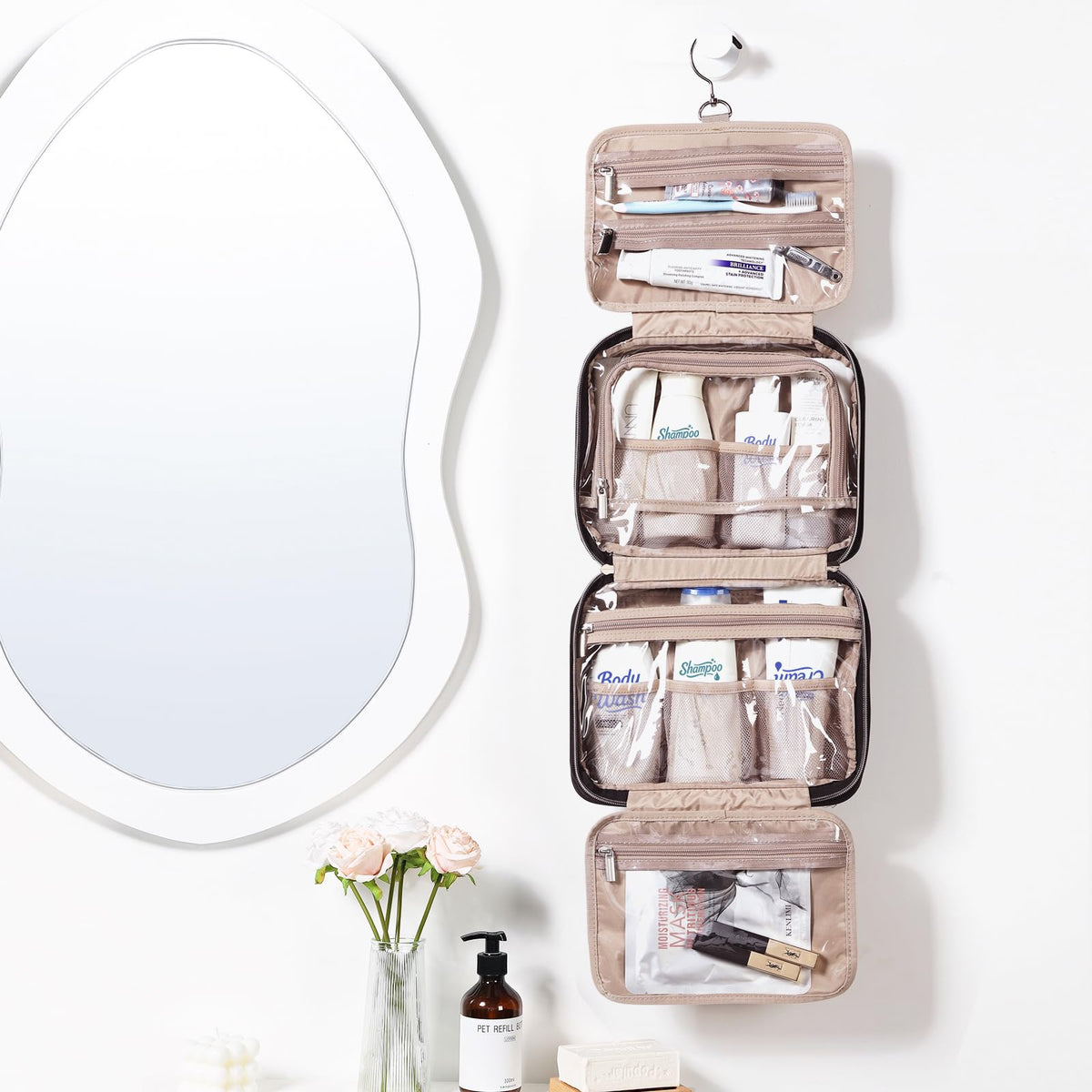 NISHEL Travel Toiletry Bag open showing compartments