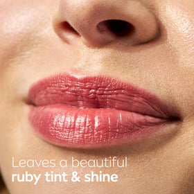 NIVEA Cherry Lip Care tinted lip balm in hand