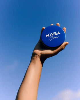 NIVEA Creme 8.4 oz tin placed on a bathroom counter