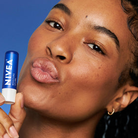 NIVEA Moisture Lip Care lip balm in a purse
