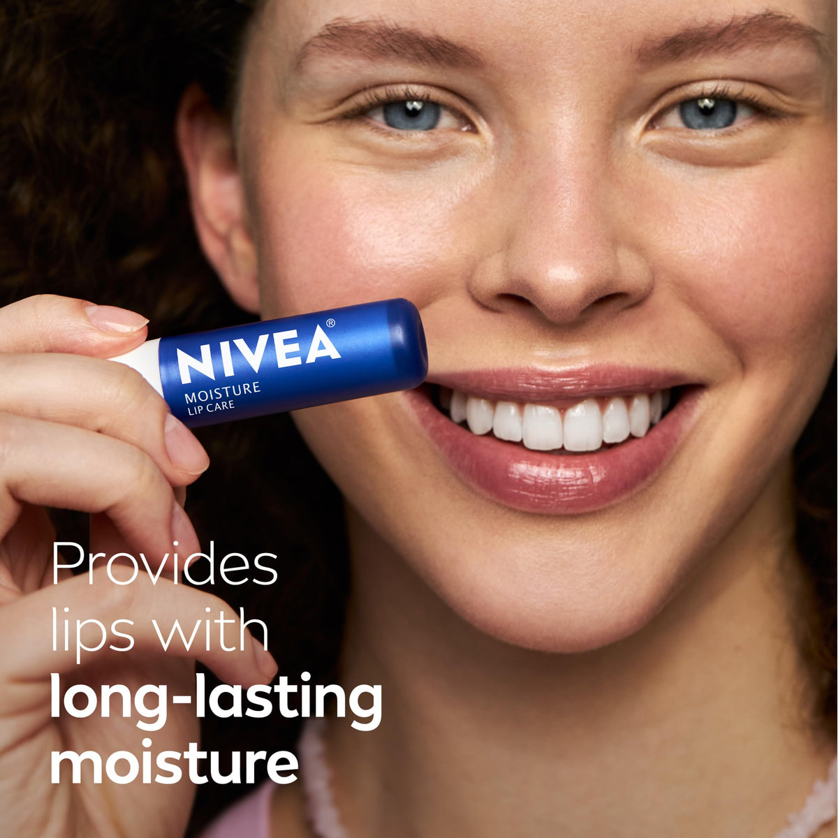 NIVEA Moisture Lip Care lip balm stick in hand