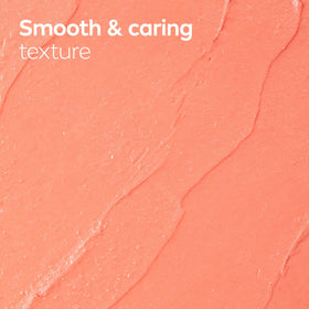 NIVEA Peach Lip Care tinted lip balm in a lifestyle setting