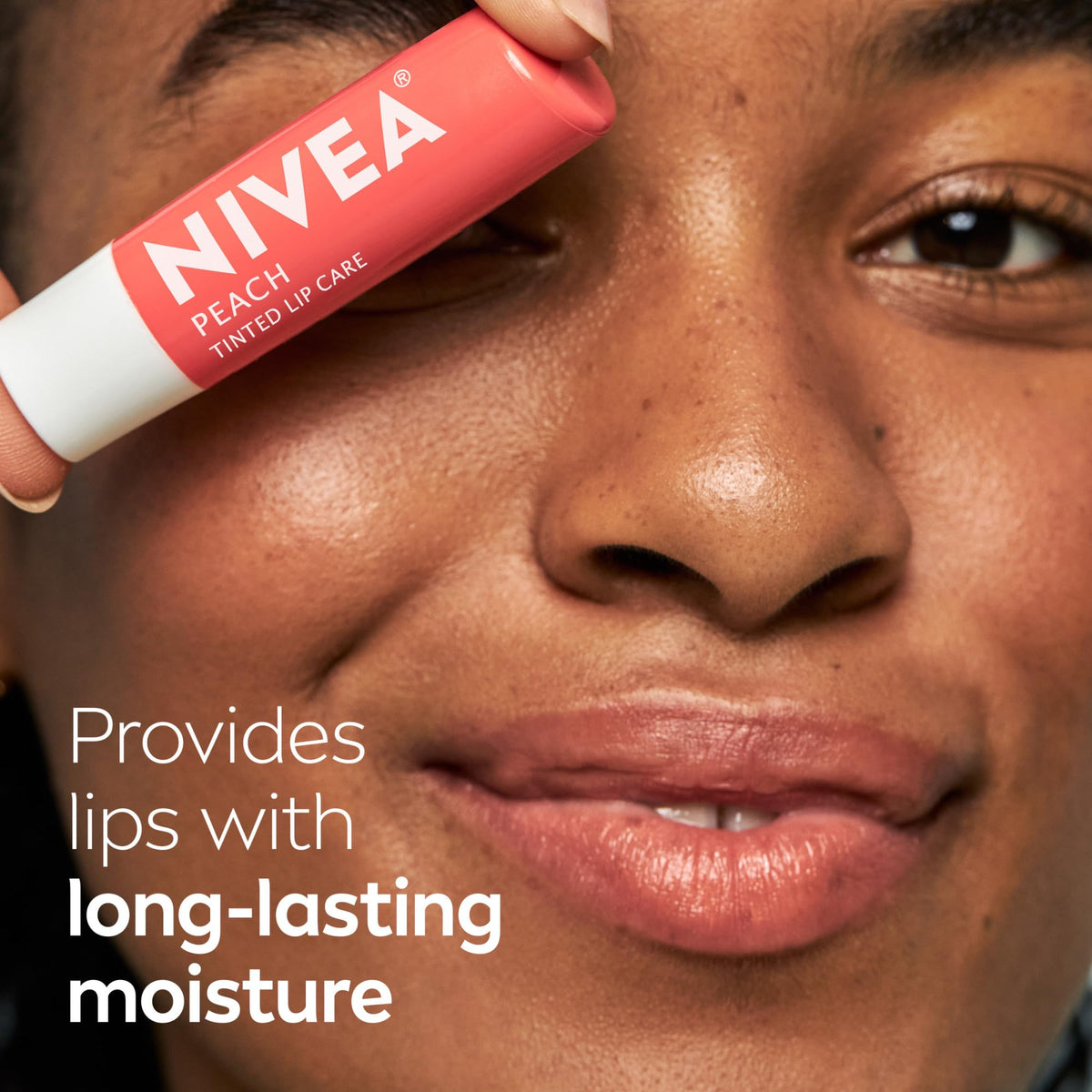 NIVEA Peach Lip Care tinted lip balm packaging close-up