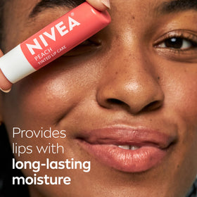 NIVEA Peach Lip Care tinted lip balm packaging close-up