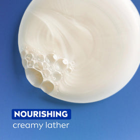 NIVEA White Peach and Jasmine Body Wash in a shower setting