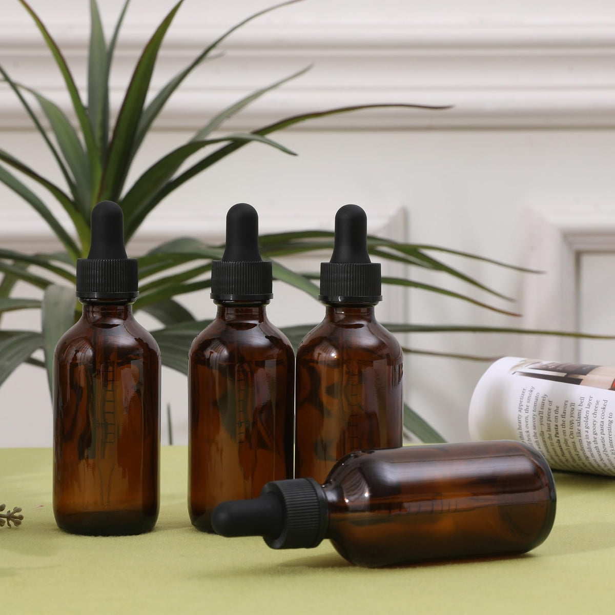 NOOEEISS dropper bottle in use for dispensing liquid