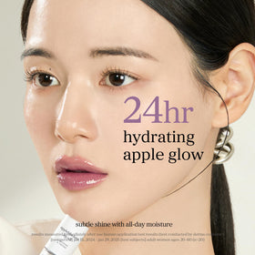 NOONI Korean Lip Oil Appleblacktea in hand showing application