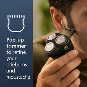 Norelco 3600 Electric Shaver displayed on a bathroom counter