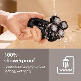 Norelco Head Shaver Pro 5000 in use during shower
