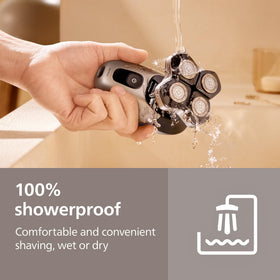 Norelco Head Shaver Pro 7000 Series in use during shower