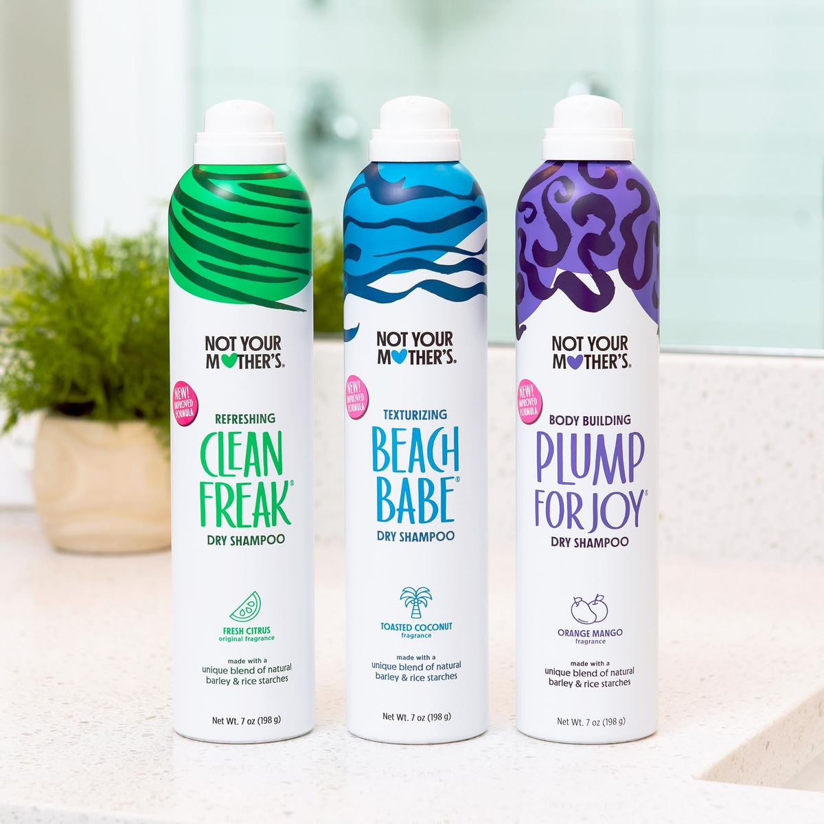 Not Your Mother's Dry Shampoo Spray Set on a bathroom shelf