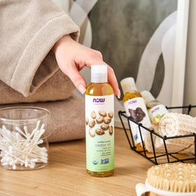 NOW Foods Organic Castor Oil 16 fl. oz in lifestyle setting