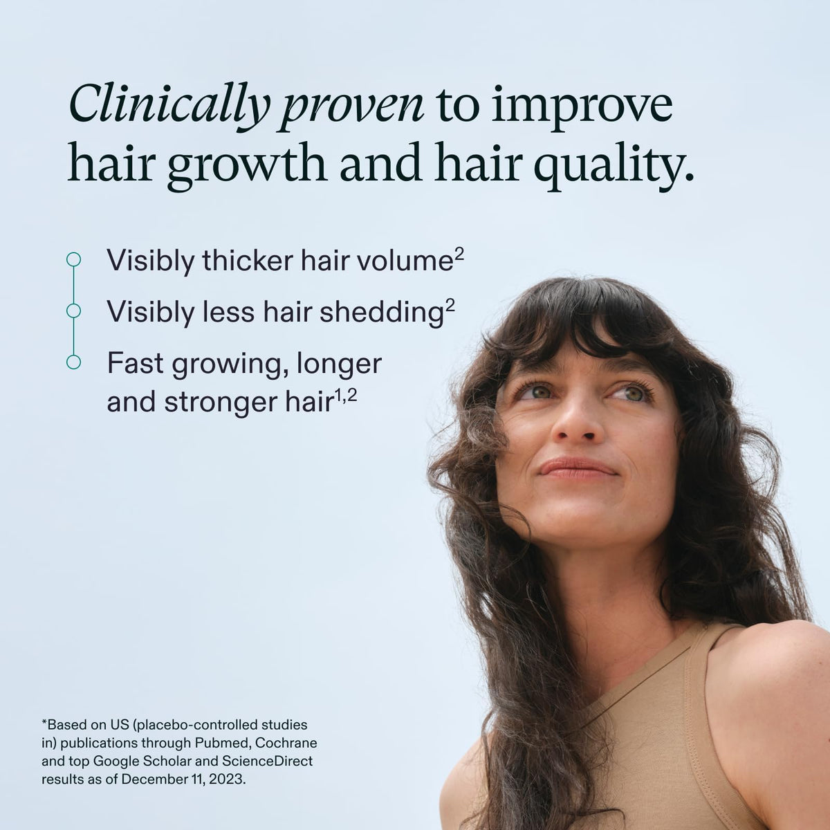 Nutrafol Women Hair Growth Supplements capsules on a wooden surface