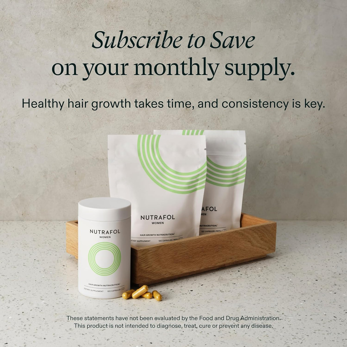 Nutrafol Women Hair Growth Supplements on a wooden table