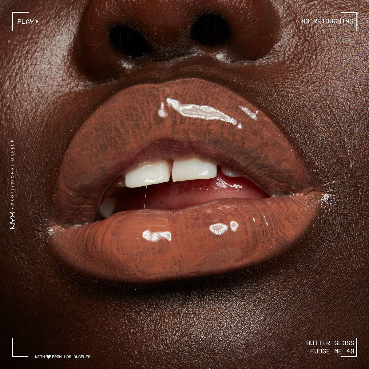 NYX Butter Gloss Brown Sugar on model's lips