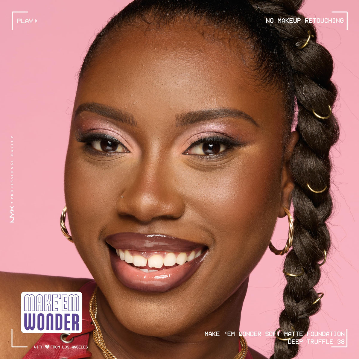 NYX Make 'Em Wonder Liquid Foundation 38 Deep Truffle in a makeup setup