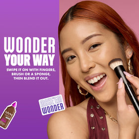 NYX Make 'Em Wonder Liquid Foundation application with brush
