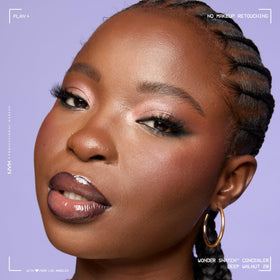 NYX Wonder Snatch Concealer Deep Walnut lifestyle shot with makeup kit