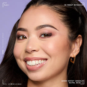 NYX Wonder Snatch Concealer on vanity with other makeup products