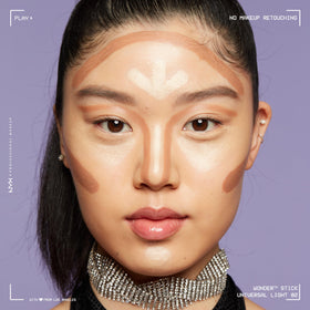 NYX Wonder Stick application on model's face for highlighting