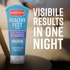 O'Keeffe's Healthy Feet Night Foot Cream on a bedside table
