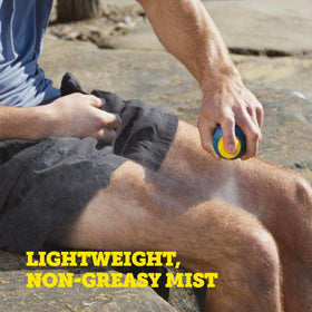 Oars + Alps SPF 30 Body Sunscreen Spray with beach background