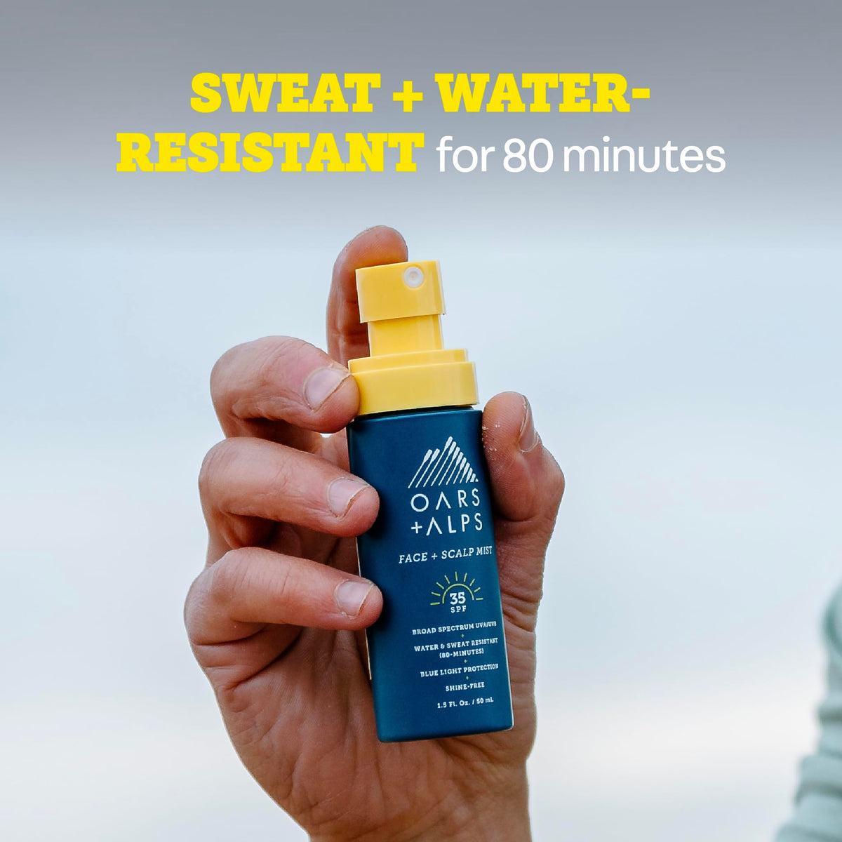 Oars + Alps SPF 35 Sunscreen Mist being applied to face