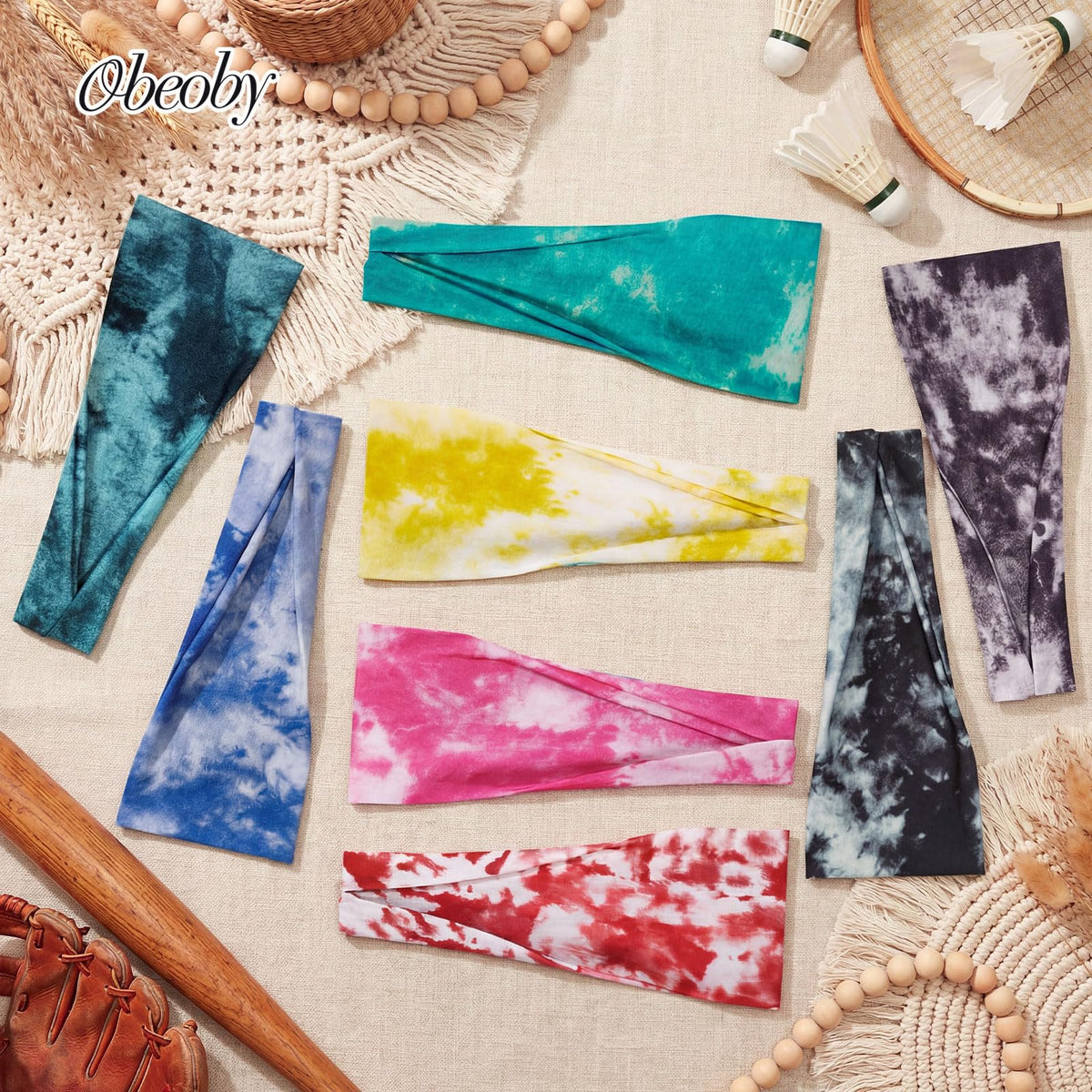 obeoby Tie Dye Headbands on a table with floral background