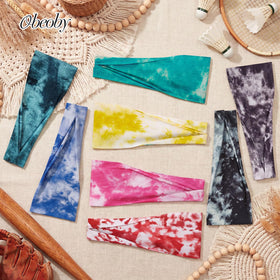obeoby Tie Dye Headbands on a table with floral background