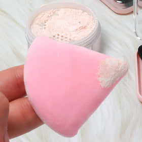 Ocim triangle makeup puff set displayed on a vanity