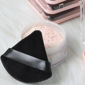 Ocim Triangle Powder Puff in nude with a rectangular case