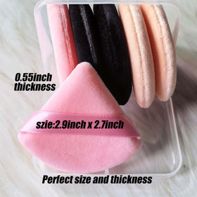 Ocim Triangle Powder Puff in pink on a makeup table