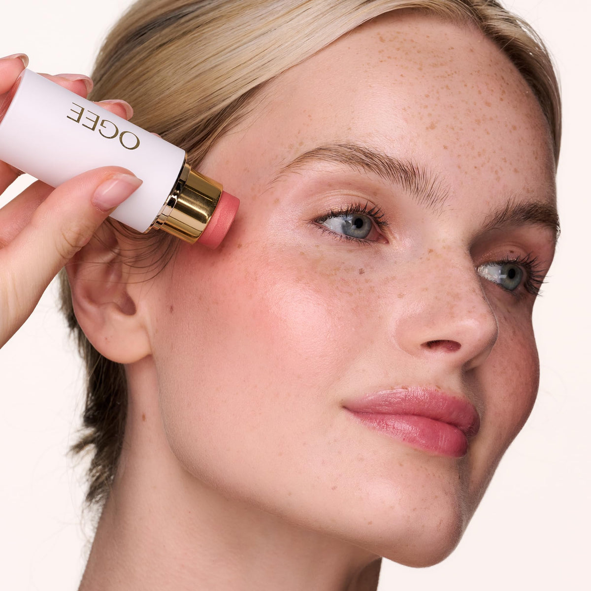 Ogee Poppy Lip Gloss applied on lips