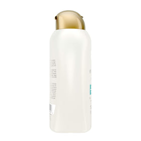 OGX Coconut Curls Shampoo in a bathroom setting