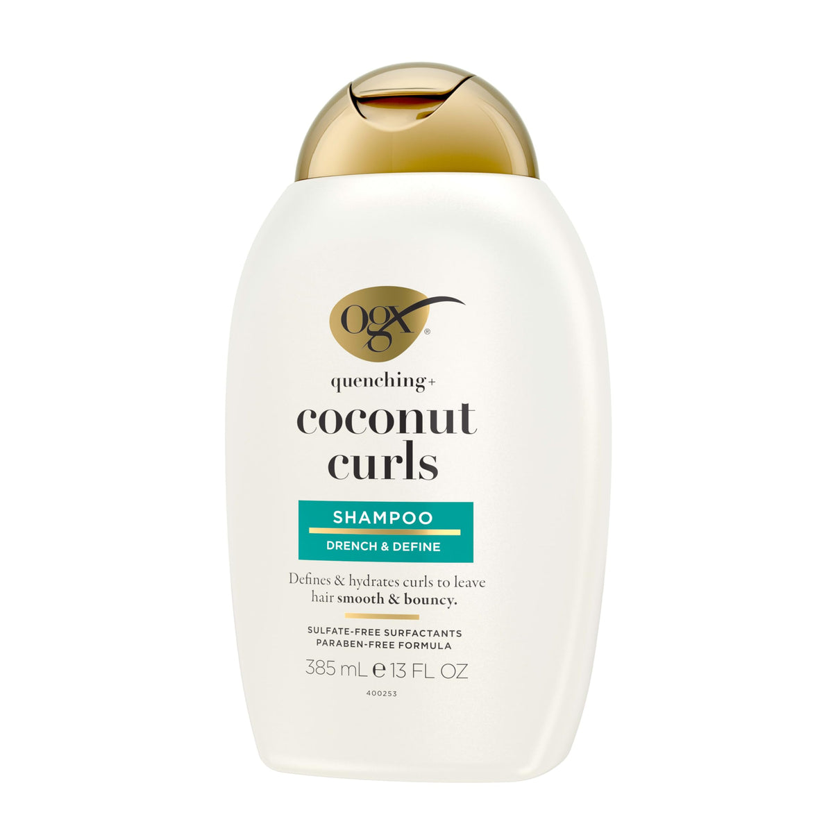 OGX Coconut Curls Shampoo on a wooden surface